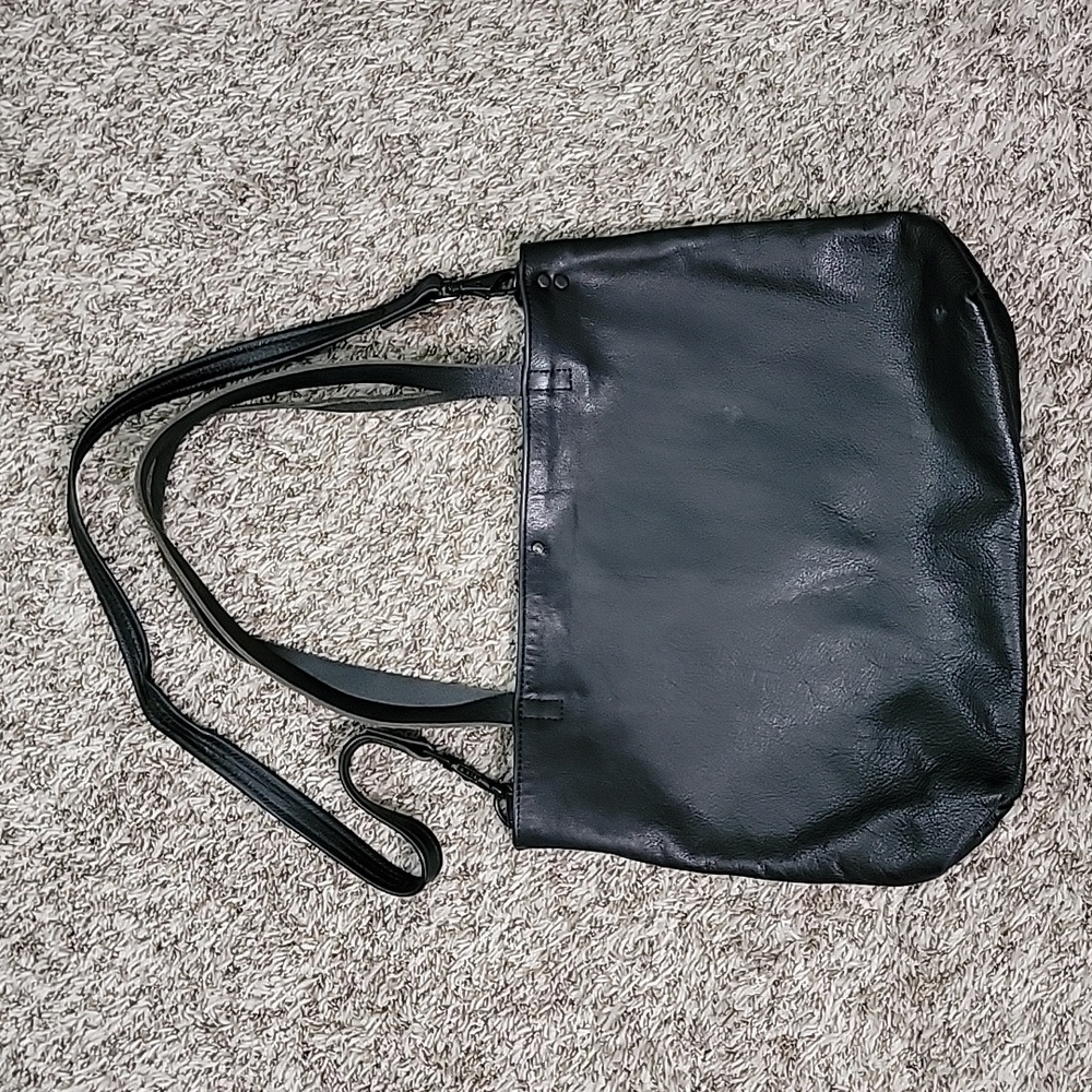 Custom handmade genuine leather purse. Used a hand full of times.